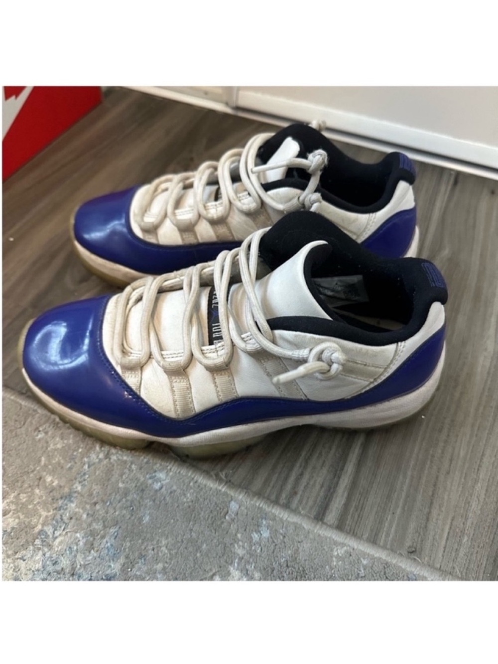 Jordan 11 Low-Top Sneakers in White and Purple